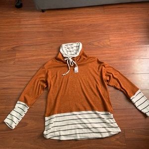 Woman’s long sleeve shirt.